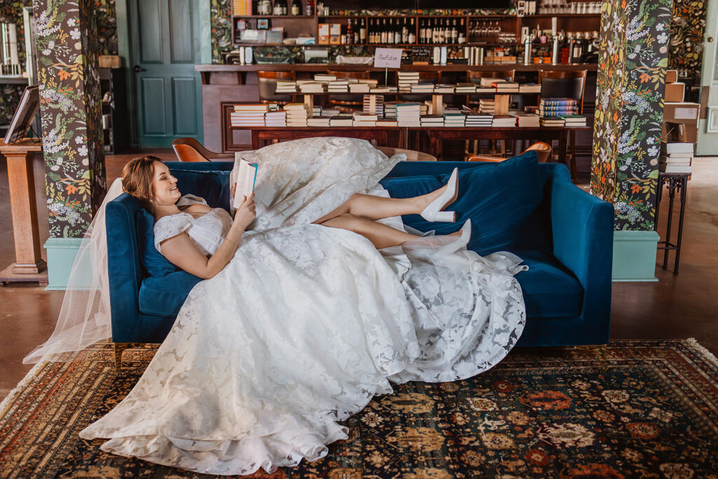 Bride poses for bridal portraits at Vintage Bookstore and Wine Bar in Austin, Texas