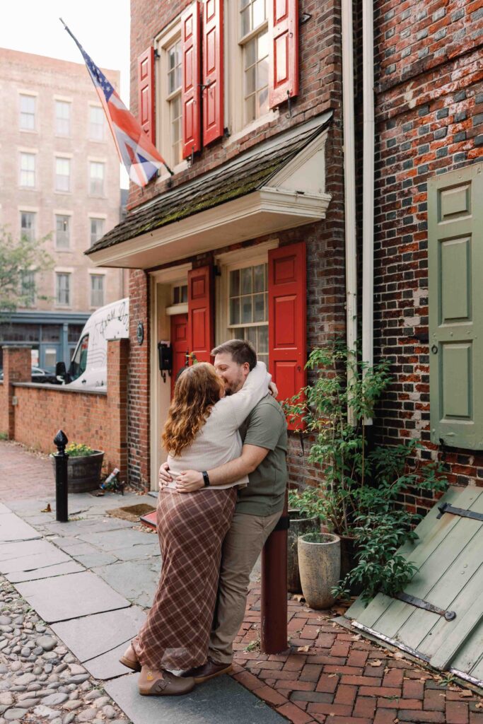 Couple poses for photos in Elfreth's Alley in Philadelphia