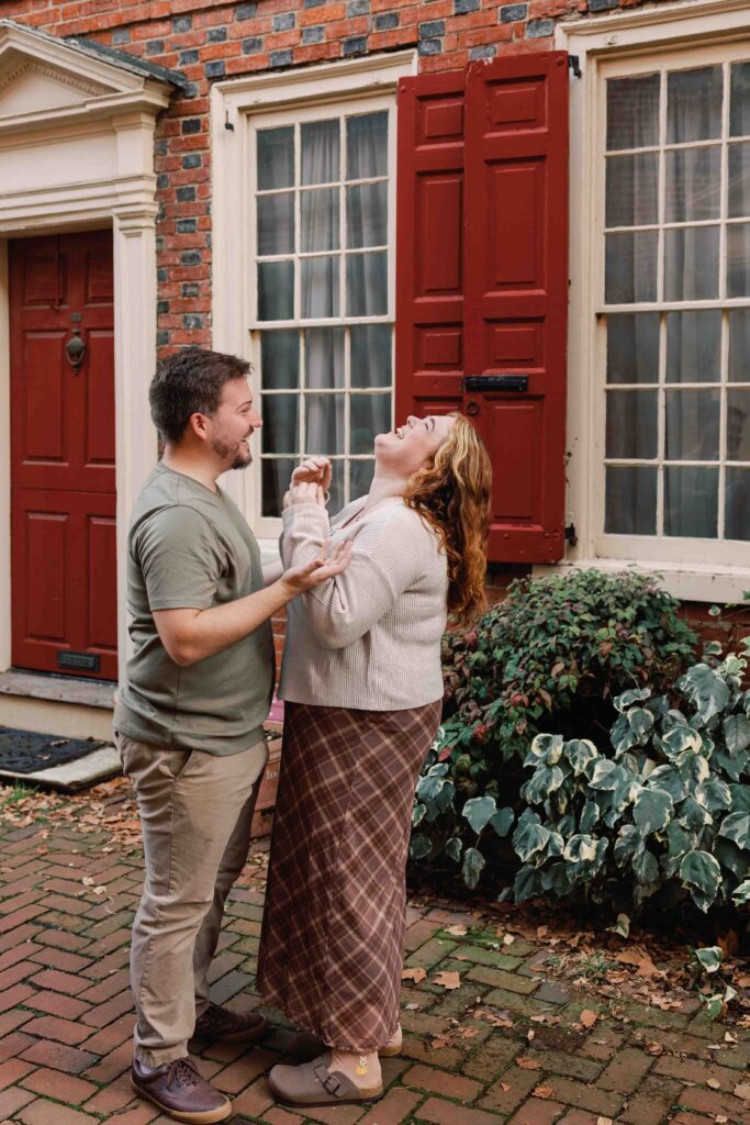 Couple poses for photos in Elfreth's Alley in Philadelphia